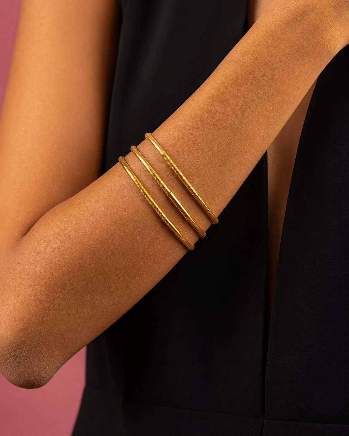 Asil Gold — gold bracelets on wrist