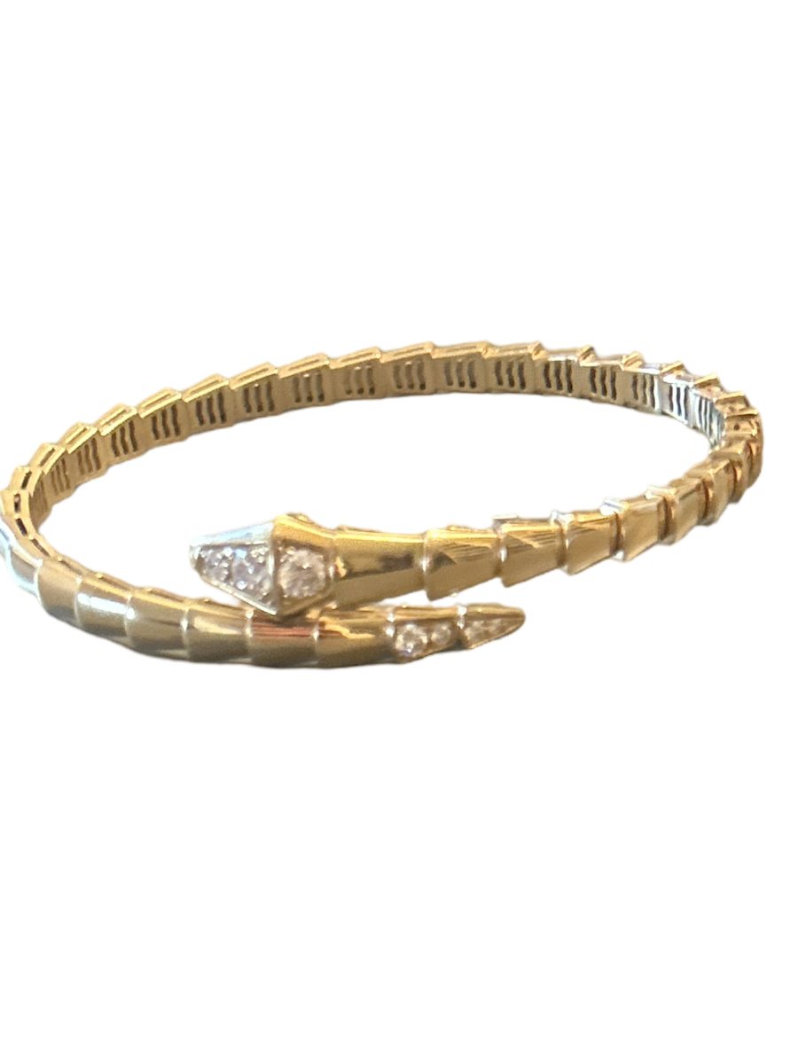 Serpent wrap bracelet with diamond-set head